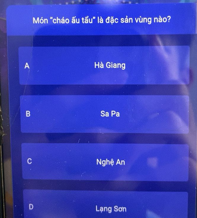 Bát cháo ấu tẩu đặc sản Hà Giang với màu tím đặc trưng của củ ấu tẩu